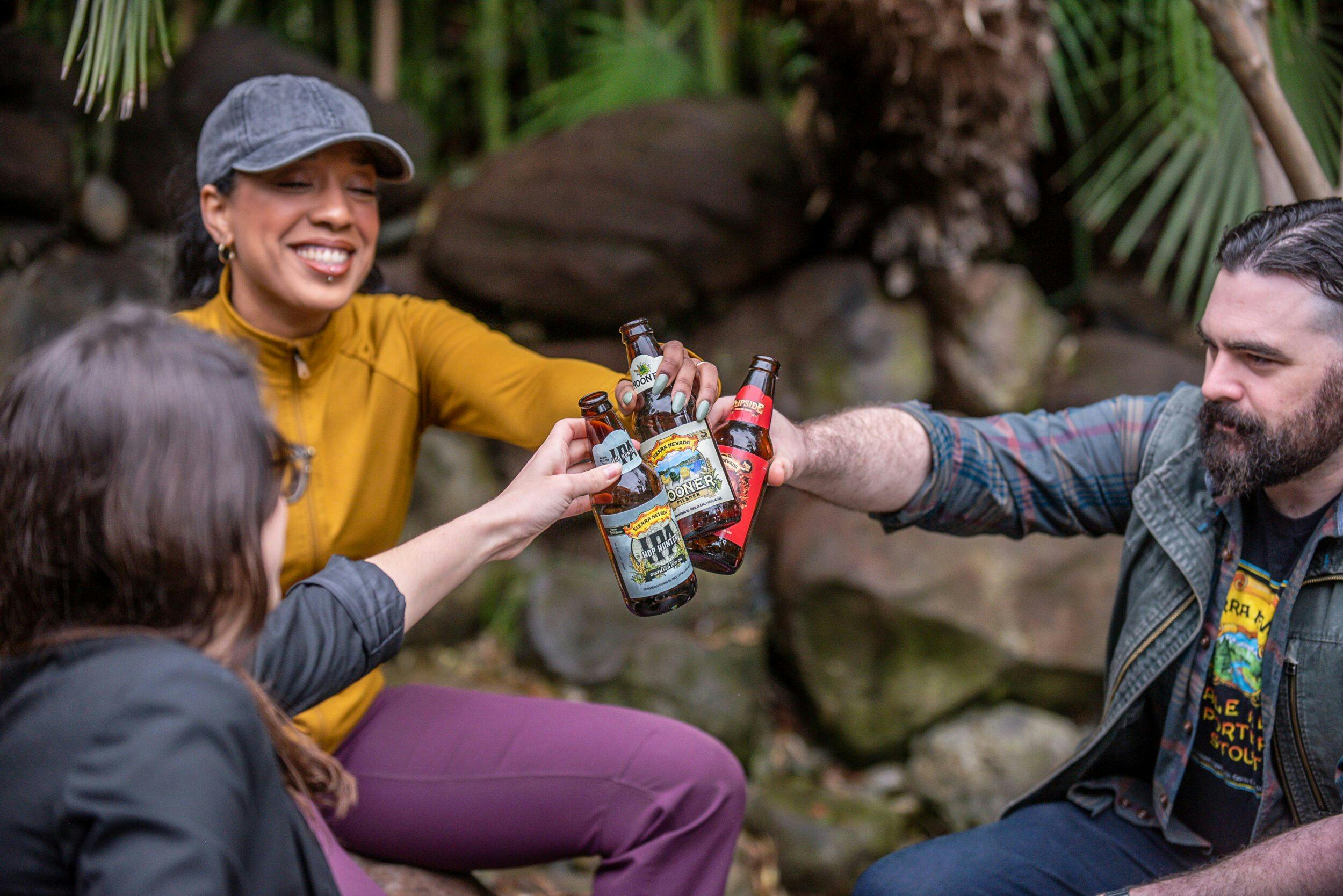 Friends relaxing with Fan Favorites beer outside